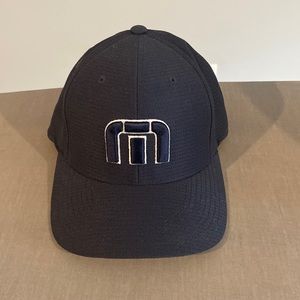 Travis Mathew navy fitted hat size XS.